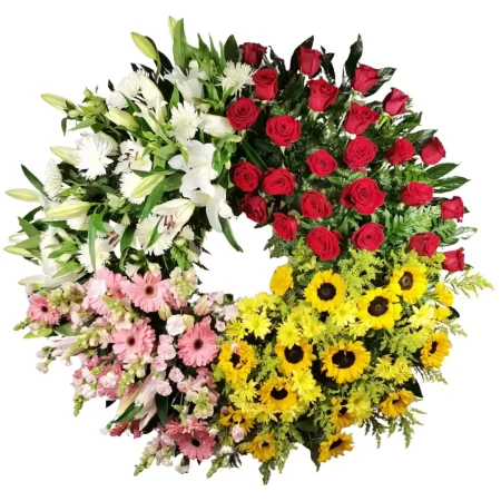 Corona Cuatro Estaciones de Girasoles, Margaritas, Gerberas, Liliums y Rosas